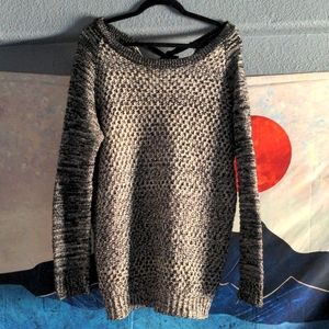 Loose fit sweater with tie back neck